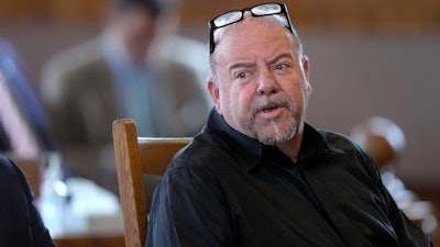 Steve Kramer is seated Wednesday, June 5, 2024, at Superior Court, in Laconia, N.H., during his arraignment in connection with charges of voter suppression and impersonating a candidate.