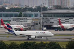 A Latam plane taxis on the runway after landing at El Dorado airport amid jet fuel shortages in Bogota, Colombia.
