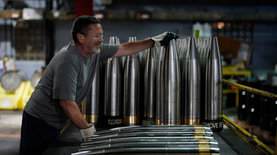 A steel worker manufactures 155 mm M795 artillery projectiles at the Scranton Army Ammunition Plant, Tuesday, Aug. 27, 2024, in Scranton, Pa.