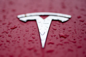 A Tesla logo is shown on Feb. 27, 2024, in Charlotte, N.C.