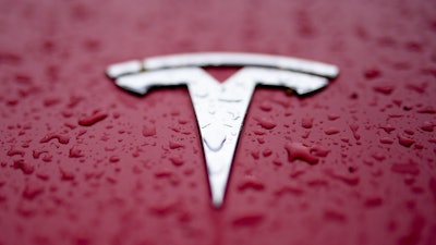 A Tesla logo is shown on Feb. 27, 2024, in Charlotte, N.C.