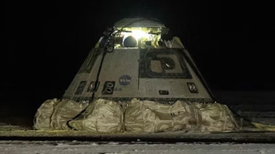 The empty Boeing Starliner capsule sits at White Sands Missile Range in New Mexico, late Friday, Sept. 6, 2024, after undocking from the International Space Station.