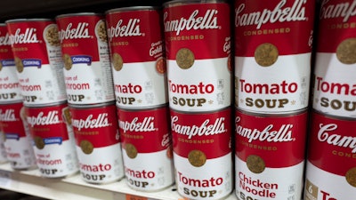 Cans of Campbell's soup are displayed in a supermarket on March 25, 2021, in New York.