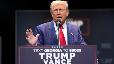 Republican presidential nominee former President Donald Trump speaks about the tax code and manufacturing at the Johnny Mercer Theatre Civic Center, Tuesday, Sept. 24, 2024, in Savannah, Ga.
