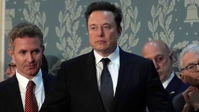 Elon Musk arrives before a joint meeting of Congress at the Capitol in Washington, July 24, 2024.