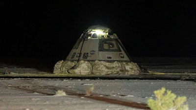 The empty Boeing Starliner capsule sits at White Sands Missile Range in New Mexico, late Friday, Sept. 6, 2024, after undocking from the International Space Station.
