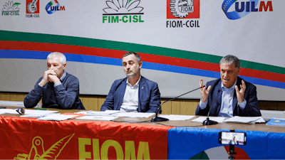 Fernando Uliano of Fim Cisl union, left, Michele De Palma of Fiom Cgil union, centre, and Rocco Palombella of Uilm union hold a news conference to announce the mobilization of Stellantis workers and the entire automotive supply chain, in Rome, Tuesday, Sept. 24, 2024.