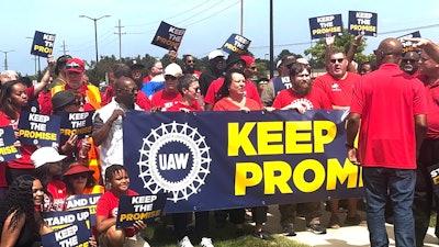 In this image from video, United Auto Workers members rally outside Stellantis' Sterling Heights Assembly Plant Friday, Aug. 23, 2024, in Sterling Heights, Mich.