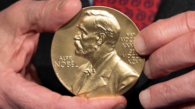 A close-up view of a Nobel Prize medal at the National Institutes of Health (NIH) in Bethesda, Md., Tuesday, Dec. 8, 2020.