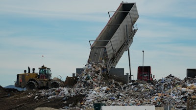 Trash is unloaded at the Otay Landfill in Chula Vista, Calif., Jan. 26, 2024.