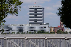 The largest regulated water and wastewater utility company in the U.S., American Water, its building in Camden, N.J., seen in the foreground on June 17, 2024, says it was the victim of a cyberattack, prompting the firm to pause billing to customers.