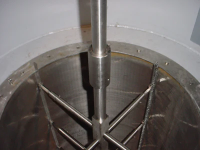 Scraper strainer cleaning is accomplished by a spring-loaded blade and brush system, managed by a fully automatic control system.