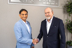 Bill Hunter (right) and Manny Gandhi finalized the SMG Group’s acquisition of Hunter Foundry Machinery Corporation on July 24, 2024 at Hunter headquarters in Schaumburg, Illinois, near Chicago.