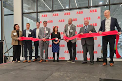 ABB Motion President Brandon Spencer cuts the ribbon at the company's new campus in New Berlin, Wisconsin.