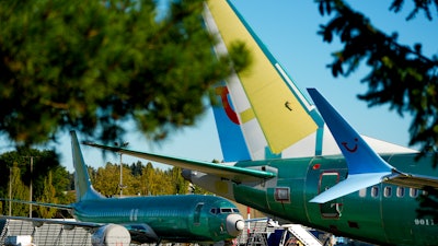 Unpainted Boeing 737 Max aircraft are seen, Tuesday, Sept. 24, 2024, at the company's facilities in Renton, Wash.
