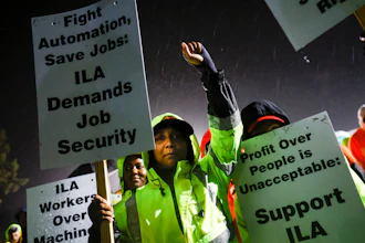 Dockworker Meikysha Wright and others strike outside the Virginia International Gateway in Portsmouth, Va., Tuesday, Oct. 1, 2024.