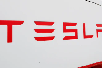 This Wednesday, March 18, 2020, file photo, shows a Tesla charging station in Port Huron, Mich.