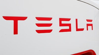 This Wednesday, March 18, 2020, file photo, shows a Tesla charging station in Port Huron, Mich.
