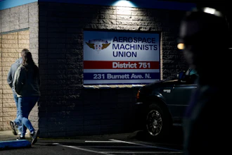 Boeing employees arrive to vote on a new contract offer from the company Monday, Nov. 4, 2024, at the Aerospace Machinists Union hall in Renton, Wash.