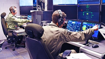 MQ-25 Air Vehicle Pilots monitor the Unmanned Carrier Aviation Mission Control System.