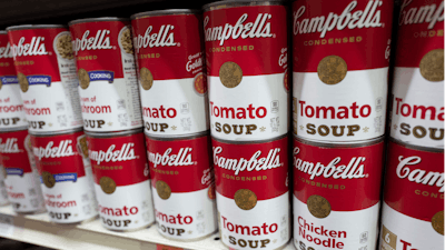 Cans of Campbell's soup are displayed in a supermarket, March 25, 2021, in New York.