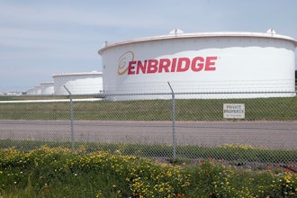 The corporate name stands out on tanks shown Friday, June 29, 2018 at at the Superior terminal of Enbridge Energy in Superior, Wis.