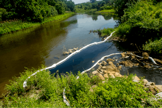 City, Genesee County and state of Michigan agencies respond to an oil spill in the Flint River, Wednesday, June 15, 2022.
