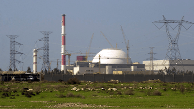 The reactor building of Iran's nuclear power plant and electricity poles are seen, at Bushehr, Iran, 750 miles (1,245 kilometers) south of the capital Tehran, Iran, Feb. 27, 2005.
