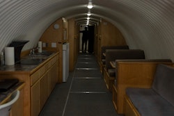 The owner, who asked not to be identified because of concerns about his privacy, turns on the lights in his underground shelter in an undisclosed Southern California city, on Dec. 16, 2024.