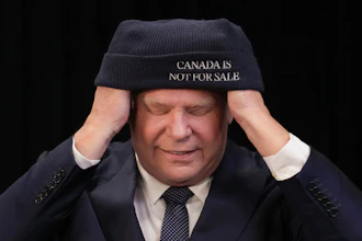 Ontario Premier Doug Ford dons a toque following a press conference with Chief Sonny Gagnon of Aroland First Nation at Queens Park, the provincial legislature, in Toronto, Tuesday, Jan. 28, 2025.