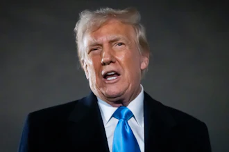 President Donald Trump speaks to reporters next to Air Force One after arriving back at Joint Base Andrews, Md., Sunday, Feb. 2, 2025.