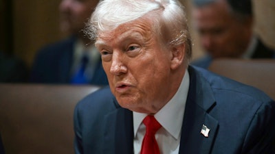 President Donald Trump holds his first Cabinet meeting at the White House in Washington, Wednesday, Feb. 26, 2025.