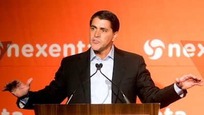 Current CEO of Workday Carl Eschenbach, then co-president of VMware, speaks at the Nexenta OpenSDx Summit Thursday, Aug. 28, 2014, in San Francisco.