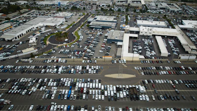 An aerial view shows auto dealerships in Cerritos, Calif., Thursday, March 27, 2025.