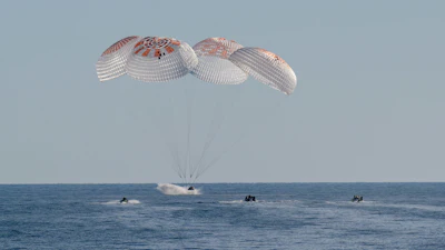 NASA astronauts Nick Hague, Suni Williams, Butch Wilmore, and Roscosmos cosmonaut Aleksandr Gorbunov land in a SpaceX Dragon spacecraft in the water off the coast of Tallahassee, Florida on March 18, 2025.