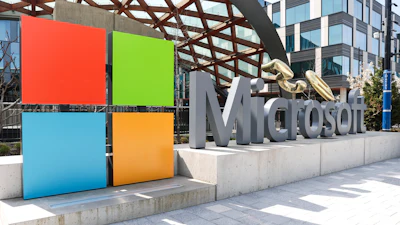 A Microsoft sign and logo are pictured at the company's headquarters, Friday, April 4, 2025, in Redmond, Wash.
