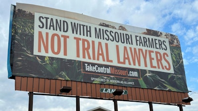 A billboard supporting legislation that would provide legal protection to manufacturers of pesticides such as Bayer's popular weedkiller Roundup, is shown in Jefferson City, Mo., May 13, 2024.