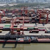 An aerial view of Xiasha Container Terminal on a canal in Hangzhou in east China's Zhejiang province Sunday, April 06, 2025.