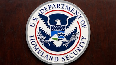 The Department of Homeland Security seal is seen on the podium at the Immigration and Customs Enforcement headquarters, Wednesday, April 9, 2025, in Washington.