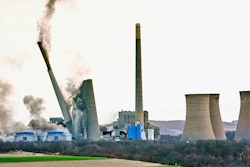 The smokestacks of the former coal-fired Homer City Generating Station crumble in a planned demolition to make way for a new natural gas-fired power plant in Homer City, Pa., March 22, 2025.
