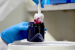 Technician Heather Browning packages a color sample made of beet powder at Sensient Technologies Corp., St. Louis., April 2, 2025.
