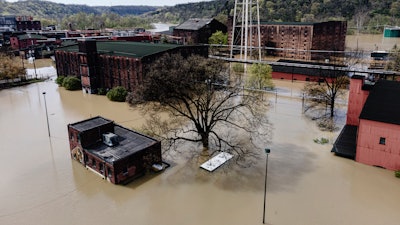 In an aerial view, the flooded Buffalo Trace Distillery is seen on Monday, April 7, 2025, in Frankfort, Ky.