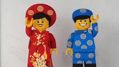 Lego characters in Vietnamese traditional costumes are displayed at Lego factory in Binh Duong, Vietnam Wednesday, April, 2, 2025.
