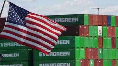 Containers are stacked at the Port of Los Angeles ,Wednesday, April 2, 2025, in Los Angeles.