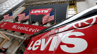 A Levi's banner adorns the facade of the New York Stock Exchange, Thursday, March 21, 2019.