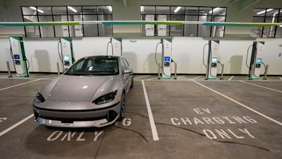 Charging bays are seen at the new Electrify America indoor electric vehicle charging station in San Francisco, Wednesday, Feb. 7, 2024.