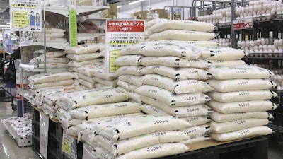 Large bags of several varieties of rice are sold at a supermarket in Hyuga, Miyazaki prefecture, southwestern Japan, on May 19, 2025.