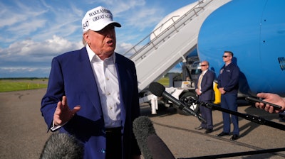 President Donald Trump speaks to reporters before boarding Air Force One at Morristown Municipal Airport in Morristown, N.J., Sunday, May 25, 2025.