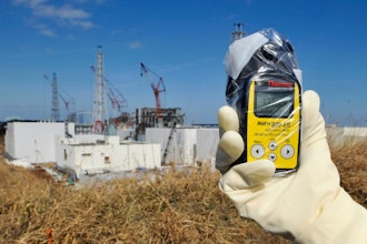 A Thermo Scientific radiation monitor indicates 131.00 mSv per hour near Unit 3 and 4 reactor buildings at Tokyo Electric Power Co.,'s tsunami-crippled Fukushima Dai-ichi nuclear power station in Okuma, Fukushima prefecture, northeastern Japan, Tuesday, Feb. 28, 2012.