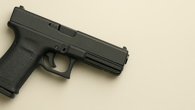 A 3D-printed, ATF-compliant serialized firearm made by Redacted Industries.
